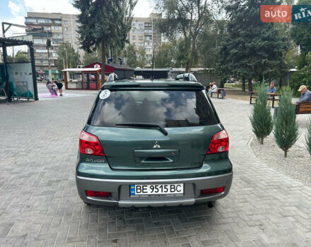 Зеленый Мицубиси Аутлендер, объемом двигателя 2.38 л и пробегом 231 тыс. км за 8000 $, фото 26 на Automoto.ua