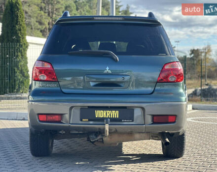 Міцубісі Аутлендер 2006 у Києві на Automoto.ua Зелений Міцубісі Аутлендер, об'ємом двигуна 2.4 л та пробігом 275 тис. км за 7350 $, фото 13 на Automoto.ua