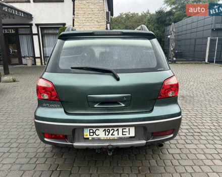 Зеленый Мицубиси Аутлендер, объемом двигателя 2.38 л и пробегом 213 тыс. км за 5999 $, фото 9 на Automoto.ua