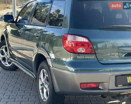 Міцубісі Аутлендер 2006 у Києві на Automoto.ua Зелений Міцубісі Аутлендер, об'ємом двигуна 2.4 л та пробігом 275 тис. км за 7350 $, фото 18 на Automoto.ua