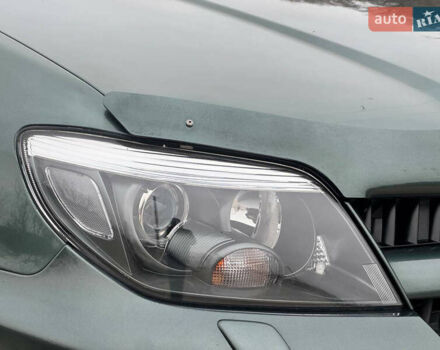 Зеленый Мицубиси Аутлендер, объемом двигателя 2 л и пробегом 194 тыс. км за 6350 $, фото 5 на Automoto.ua