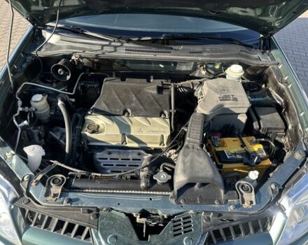 Міцубісі Аутлендер 2006 у Києві на Automoto.ua Зелений Міцубісі Аутлендер, об'ємом двигуна 2.4 л та пробігом 275 тис. км за 7350 $, фото 9 на Automoto.ua