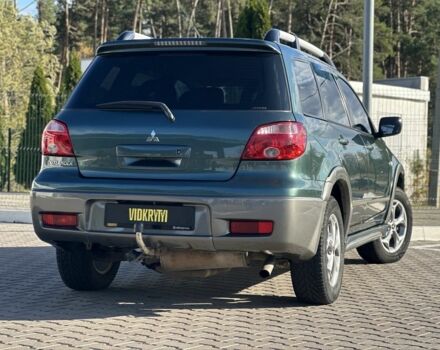 Міцубісі Аутлендер 2006 у Києві на Automoto.ua Зелений Міцубісі Аутлендер, об'ємом двигуна 2.4 л та пробігом 275 тис. км за 7350 $, фото 5 на Automoto.ua