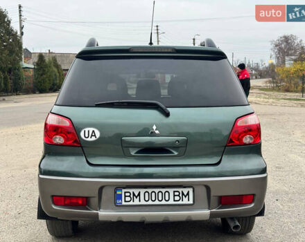 Зеленый Мицубиси Аутлендер, объемом двигателя 2 л и пробегом 194 тыс. км за 6350 $, фото 9 на Automoto.ua