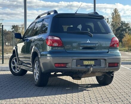Міцубісі Аутлендер 2006 у Києві на Automoto.ua Зелений Міцубісі Аутлендер, об'ємом двигуна 2.4 л та пробігом 275 тис. км за 7350 $, фото 7 на Automoto.ua