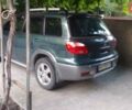 Зеленый Мицубиси Аутлендер, объемом двигателя 2.38 л и пробегом 176 тыс. км за 6200 $, фото 3 на Automoto.ua