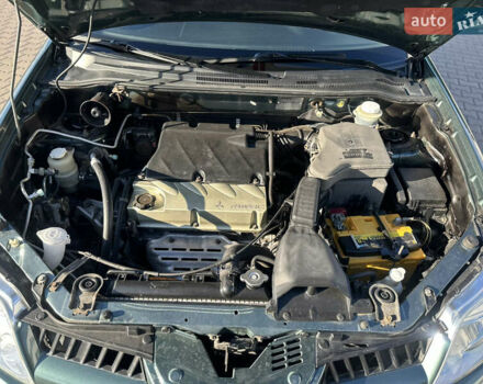 Міцубісі Аутлендер 2006 у Києві на Automoto.ua Зелений Міцубісі Аутлендер, об'ємом двигуна 2.4 л та пробігом 275 тис. км за 7350 $, фото 21 на Automoto.ua