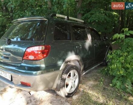 Зеленый Мицубиси Аутлендер, объемом двигателя 2.38 л и пробегом 176 тыс. км за 6200 $, фото 10 на Automoto.ua