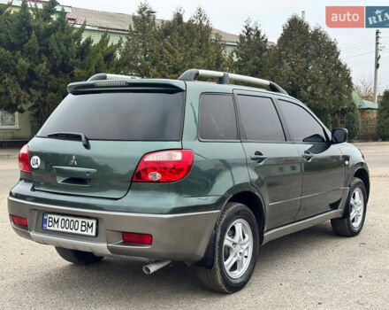 Зеленый Мицубиси Аутлендер, объемом двигателя 2 л и пробегом 194 тыс. км за 6350 $, фото 11 на Automoto.ua