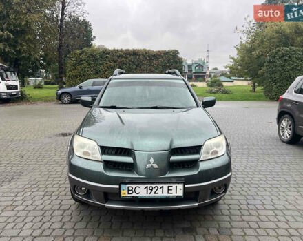 Зеленый Мицубиси Аутлендер, объемом двигателя 2.38 л и пробегом 213 тыс. км за 5999 $, фото 8 на Automoto.ua