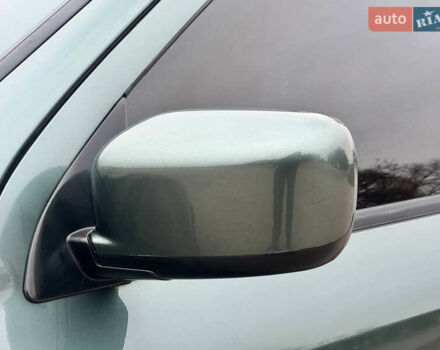 Зеленый Мицубиси Аутлендер, объемом двигателя 2 л и пробегом 194 тыс. км за 6350 $, фото 7 на Automoto.ua