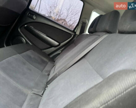 Зеленый Мицубиси Аутлендер, объемом двигателя 2 л и пробегом 194 тыс. км за 6350 $, фото 26 на Automoto.ua