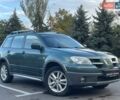 Зеленый Мицубиси Аутлендер, объемом двигателя 2.38 л и пробегом 212 тыс. км за 6899 $, фото 2 на Automoto.ua