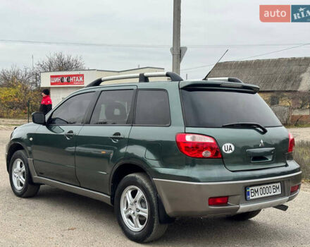 Зеленый Мицубиси Аутлендер, объемом двигателя 2 л и пробегом 194 тыс. км за 6350 $, фото 10 на Automoto.ua