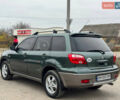 Зеленый Мицубиси Аутлендер, объемом двигателя 2 л и пробегом 194 тыс. км за 6350 $, фото 10 на Automoto.ua
