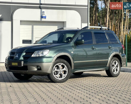 Міцубісі Аутлендер 2006 у Києві на Automoto.ua Зелений Міцубісі Аутлендер, об'ємом двигуна 2.4 л та пробігом 275 тис. км за 7350 $, фото 4 на Automoto.ua