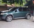 Зеленый Мицубиси Аутлендер, объемом двигателя 2.38 л и пробегом 176 тыс. км за 6200 $, фото 1 на Automoto.ua