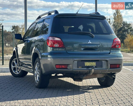 Міцубісі Аутлендер 2006 у Києві на Automoto.ua Зелений Міцубісі Аутлендер, об'ємом двигуна 2.4 л та пробігом 275 тис. км за 7350 $, фото 19 на Automoto.ua