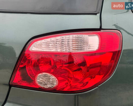 Зеленый Мицубиси Аутлендер, объемом двигателя 2 л и пробегом 194 тыс. км за 6350 $, фото 12 на Automoto.ua