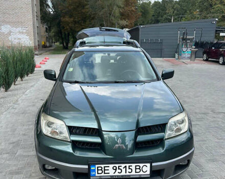 Зеленый Мицубиси Аутлендер, объемом двигателя 2.38 л и пробегом 231 тыс. км за 8000 $, фото 23 на Automoto.ua