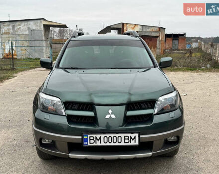 Зеленый Мицубиси Аутлендер, объемом двигателя 2 л и пробегом 194 тыс. км за 6350 $, фото 1 на Automoto.ua