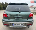 Зеленый Мицубиси Аутлендер, объемом двигателя 2 л и пробегом 194 тыс. км за 6350 $, фото 15 на Automoto.ua