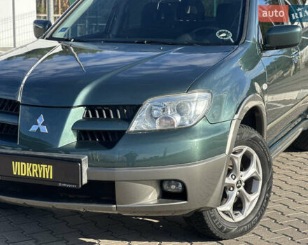 Міцубісі Аутлендер 2006 у Києві на Automoto.ua Зелений Міцубісі Аутлендер, об'ємом двигуна 2.4 л та пробігом 275 тис. км за 7350 $, фото 3 на Automoto.ua