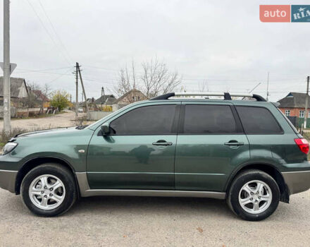 Зеленый Мицубиси Аутлендер, объемом двигателя 2 л и пробегом 194 тыс. км за 6350 $, фото 8 на Automoto.ua