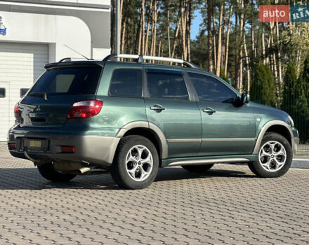 Міцубісі Аутлендер 2006 у Києві на Automoto.ua Зелений Міцубісі Аутлендер, об'ємом двигуна 2.4 л та пробігом 275 тис. км за 7350 $, фото 10 на Automoto.ua