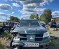 Зелений Міцубісі Аутлендер, об'ємом двигуна 2.4 л та пробігом 240 тис. км за 3000 $, фото 1 на Automoto.ua