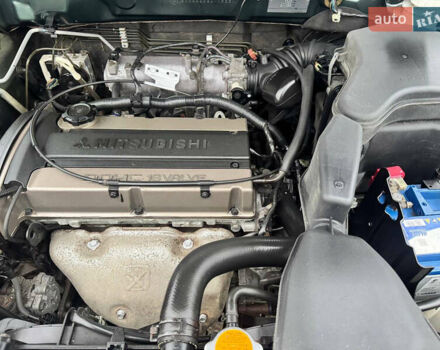 Зеленый Мицубиси Аутлендер, объемом двигателя 2 л и пробегом 194 тыс. км за 6350 $, фото 46 на Automoto.ua