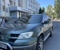 Зеленый Мицубиси Аутлендер, объемом двигателя 2.4 л и пробегом 313 тыс. км за 5800 $, фото 3 на Automoto.ua
