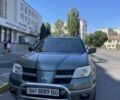 Зеленый Мицубиси Аутлендер, объемом двигателя 2.4 л и пробегом 313 тыс. км за 6200 $, фото 2 на Automoto.ua