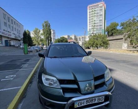 Зеленый Мицубиси Аутлендер, объемом двигателя 2.4 л и пробегом 313 тыс. км за 6200 $, фото 15 на Automoto.ua