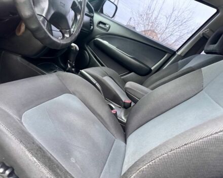 Зелений Міцубісі Аутлендер, об'ємом двигуна 2 л та пробігом 194 тис. км за 6350 $, фото 9 на Automoto.ua