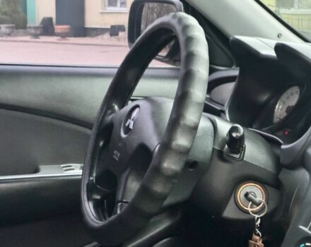 Зелений Міцубісі Аутлендер, об'ємом двигуна 2 л та пробігом 194 тис. км за 6350 $, фото 20 на Automoto.ua