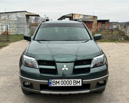 Зелений Міцубісі Аутлендер, об'ємом двигуна 2 л та пробігом 194 тис. км за 6350 $, фото 1 на Automoto.ua