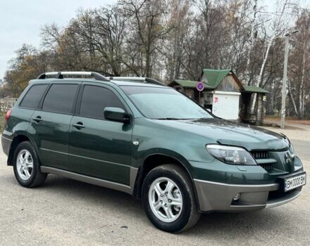 Зелений Міцубісі Аутлендер, об'ємом двигуна 2 л та пробігом 194 тис. км за 6350 $, фото 8 на Automoto.ua