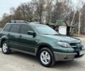 Зелений Міцубісі Аутлендер, об'ємом двигуна 2 л та пробігом 194 тис. км за 6350 $, фото 8 на Automoto.ua