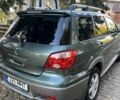 Мицубиси Аутлендер 2007 в Тульчине на Automoto.ua Зеленый Мицубиси Аутлендер, объемом двигателя 2.4 л и пробегом 150 тыс. км за 4600 $, фото 3 на Automoto.ua