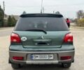 Зелений Міцубісі Аутлендер, об'ємом двигуна 2 л та пробігом 194 тис. км за 6350 $, фото 5 на Automoto.ua