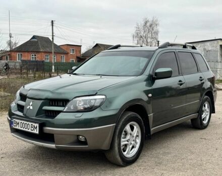 Зелений Міцубісі Аутлендер, об'ємом двигуна 2 л та пробігом 194 тис. км за 6350 $, фото 2 на Automoto.ua