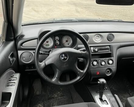 Зеленый Мицубиси Аутлендер, объемом двигателя 2.4 л и пробегом 119 тыс. км за 4800 $, фото 5 на Automoto.ua