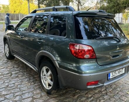 Мицубиси Аутлендер 2007 в Тульчине на Automoto.ua Зеленый Мицубиси Аутлендер, объемом двигателя 2.4 л и пробегом 150 тыс. км за 4600 $, фото 4 на Automoto.ua