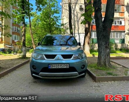 Зеленый Мицубиси Аутлендер, объемом двигателя 3 л и пробегом 233 тыс. км за 9000 $, фото 1 на Automoto.ua