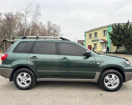 Зелений Міцубісі Аутлендер, об'ємом двигуна 2 л та пробігом 194 тис. км за 6350 $, фото 7 на Automoto.ua