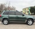 Зелений Міцубісі Аутлендер, об'ємом двигуна 2 л та пробігом 194 тис. км за 6350 $, фото 7 на Automoto.ua