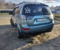 Зеленый Мицубиси Аутлендер, объемом двигателя 3 л и пробегом 235 тыс. км за 7000 $, фото 1 на Automoto.ua