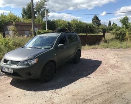 Зеленый Мицубиси Аутлендер, объемом двигателя 2 л и пробегом 317 тыс. км за 4000 $, фото 1 на Automoto.ua