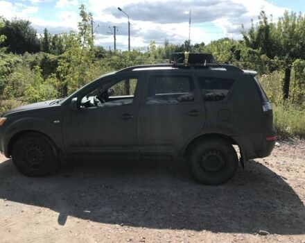 Зеленый Мицубиси Аутлендер, объемом двигателя 2 л и пробегом 317 тыс. км за 4000 $, фото 2 на Automoto.ua